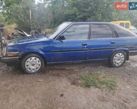 Синій Тойота Каріна, об'ємом двигуна 2 л та пробігом 250 тис. км за 900 $, фото 1 на Automoto.ua