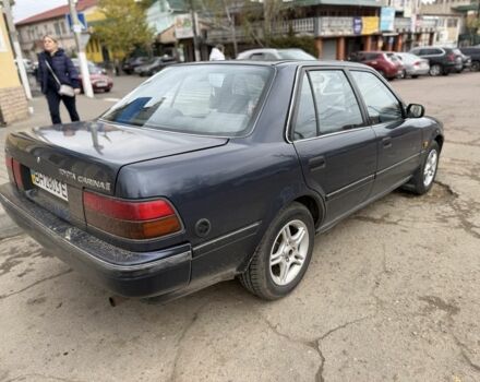 Синий Тойота Карина, объемом двигателя 1.6 л и пробегом 222 тыс. км за 1550 $, фото 1 на Automoto.ua