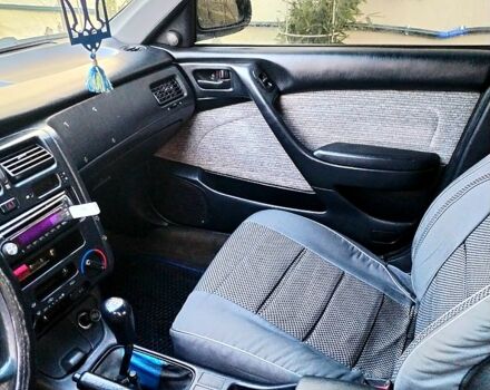 Синий Тойота Карина, объемом двигателя 1.6 л и пробегом 390 тыс. км за 2600 $, фото 1 на Automoto.ua