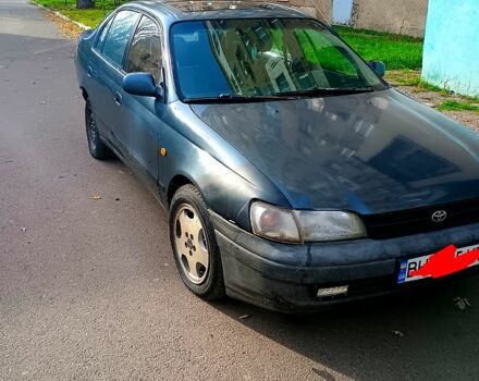 Синий Тойота Карина, объемом двигателя 2 л и пробегом 190 тыс. км за 1500 $, фото 1 на Automoto.ua