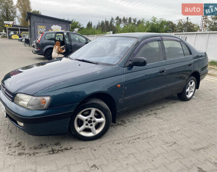 Синий Тойота Карина, объемом двигателя 1.59 л и пробегом 380 тыс. км за 2400 $, фото 1 на Automoto.ua