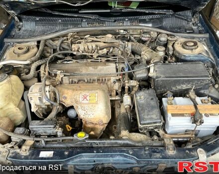 Зеленый Тойота Карина, объемом двигателя 2 л и пробегом 417 тыс. км за 2000 $, фото 4 на Automoto.ua