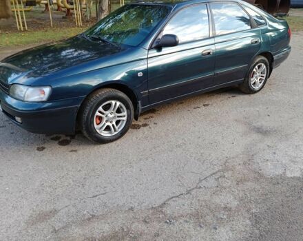 Зеленый Тойота Карина, объемом двигателя 1.6 л и пробегом 342 тыс. км за 3200 $, фото 1 на Automoto.ua