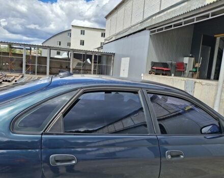 Зеленый Тойота Карина, объемом двигателя 2 л и пробегом 359 тыс. км за 2000 $, фото 2 на Automoto.ua