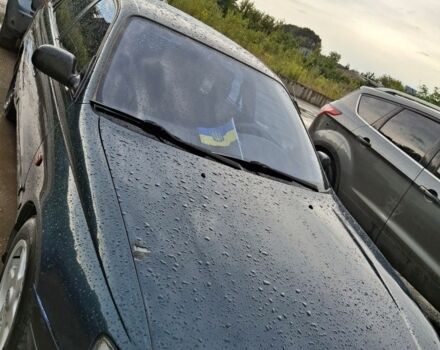 Зеленый Тойота Карина, объемом двигателя 2 л и пробегом 359 тыс. км за 2000 $, фото 5 на Automoto.ua