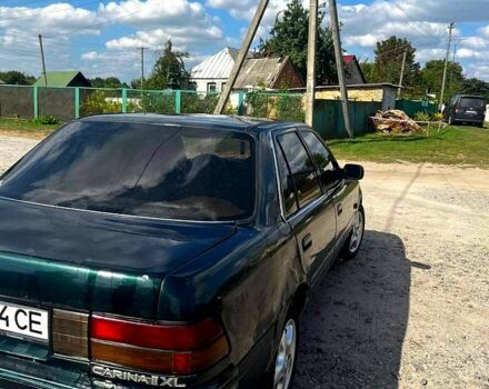 Зеленый Тойота Карина, объемом двигателя 1.6 л и пробегом 200 тыс. км за 800 $, фото 1 на Automoto.ua