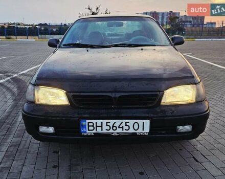 Зелений Тойота Каріна, об'ємом двигуна 1.59 л та пробігом 333 тис. км за 1850 $, фото 23 на Automoto.ua