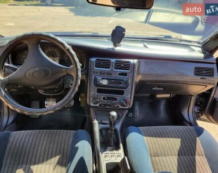 Зелений Тойота Каріна, об'ємом двигуна 2 л та пробігом 300 тис. км за 2300 $, фото 1 на Automoto.ua