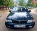 Зелений Тойота Каріна, об'ємом двигуна 1.6 л та пробігом 400 тис. км за 2000 $, фото 12 на Automoto.ua