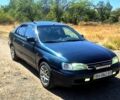 Зеленый Тойота Карина, объемом двигателя 2 л и пробегом 417 тыс. км за 2500 $, фото 1 на Automoto.ua