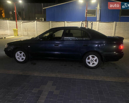 Зеленый Тойота Карина, объемом двигателя 1.6 л и пробегом 470 тыс. км за 2000 $, фото 2 на Automoto.ua