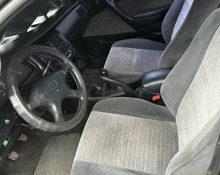 Зеленый Тойота Карина, объемом двигателя 2 л и пробегом 500 тыс. км за 1500 $, фото 3 на Automoto.ua