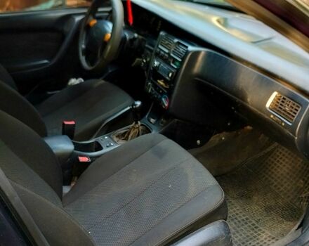 Зелений Тойота Каріна, об'ємом двигуна 1.6 л та пробігом 438 тис. км за 2000 $, фото 2 на Automoto.ua