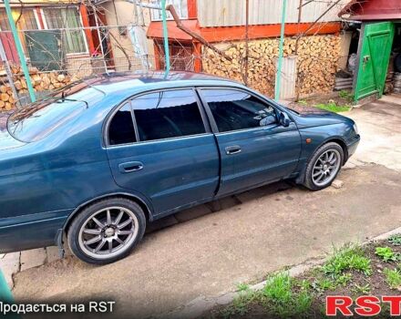 Зелений Тойота Каріна, об'ємом двигуна 1.6 л та пробігом 0 тис. км за 2200 $, фото 6 на Automoto.ua