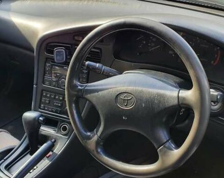 Зеленый Тойота Карина, объемом двигателя 2 л и пробегом 450 тыс. км за 3500 $, фото 2 на Automoto.ua