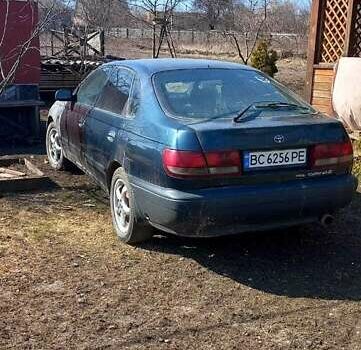 Зелений Тойота Каріна, об'ємом двигуна 1.6 л та пробігом 467 тис. км за 2000 $, фото 1 на Automoto.ua