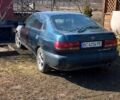 Зелений Тойота Каріна, об'ємом двигуна 1.6 л та пробігом 467 тис. км за 2000 $, фото 1 на Automoto.ua
