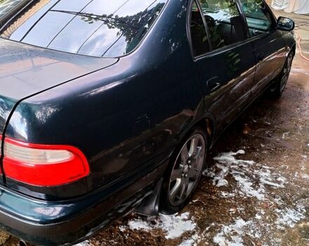 Зеленый Тойота Карина, объемом двигателя 2 л и пробегом 525 тыс. км за 2400 $, фото 3 на Automoto.ua