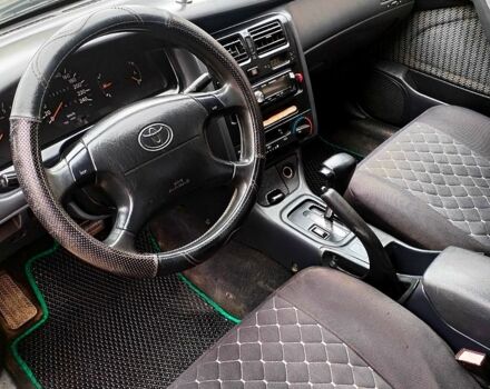 Зеленый Тойота Карина, объемом двигателя 2 л и пробегом 525 тыс. км за 2400 $, фото 8 на Automoto.ua