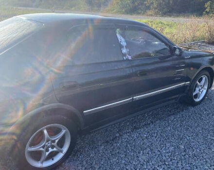 Зелений Тойота Каріна, об'ємом двигуна 1.76 л та пробігом 372 тис. км за 2150 $, фото 1 на Automoto.ua