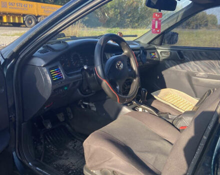 Зелений Тойота Каріна, об'ємом двигуна 1.76 л та пробігом 372 тис. км за 2150 $, фото 4 на Automoto.ua