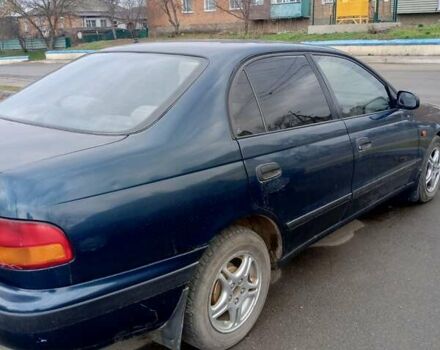 Зелений Тойота Каріна, об'ємом двигуна 2 л та пробігом 370 тис. км за 2650 $, фото 7 на Automoto.ua