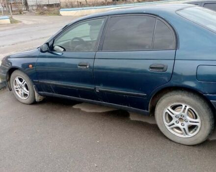 Зелений Тойота Каріна, об'ємом двигуна 2 л та пробігом 370 тис. км за 2650 $, фото 4 на Automoto.ua