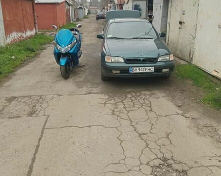 Зелений Тойота Каріна, об'ємом двигуна 1.76 л та пробігом 345 тис. км за 3500 $, фото 2 на Automoto.ua