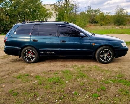 Зеленый Тойота Карина, объемом двигателя 2 л и пробегом 380 тыс. км за 3700 $, фото 3 на Automoto.ua