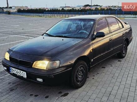 Зеленый Тойота Карина, объемом двигателя 1.59 л и пробегом 333 тыс. км за 1850 $, фото 1 на Automoto.ua