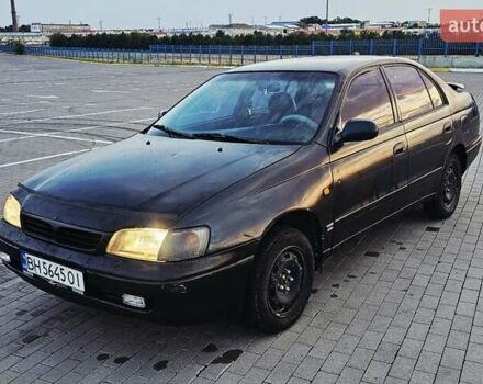Зелений Тойота Каріна, об'ємом двигуна 1.59 л та пробігом 333 тис. км за 1850 $, фото 1 на Automoto.ua
