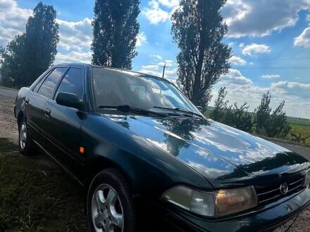 Тойота Карина 1992 в Коростышеве на Automoto.ua Зеленый Тойота Карина, объемом двигателя 1.6 л и пробегом 200 тыс. км за 800 $, фото 1 на Automoto.ua