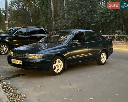 Зеленый Тойота Карина, объемом двигателя 1.6 л и пробегом 470 тыс. км за 2000 $, фото 1 на Automoto.ua