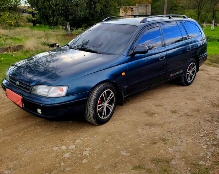 Зеленый Тойота Карина, объемом двигателя 2 л и пробегом 380 тыс. км за 3700 $, фото 1 на Automoto.ua