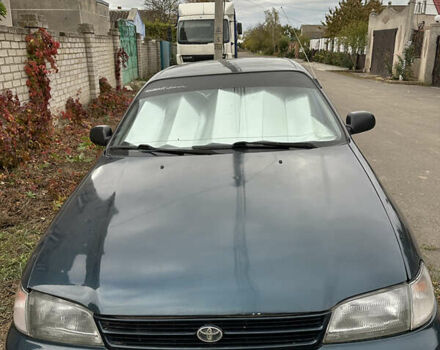 Зеленый Тойота Карина, объемом двигателя 2 л и пробегом 500 тыс. км за 1500 $, фото 1 на Automoto.ua