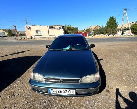 Зеленый Тойота Карина, объемом двигателя 2 л и пробегом 417 тыс. км за 2000 $, фото 1 на Automoto.ua