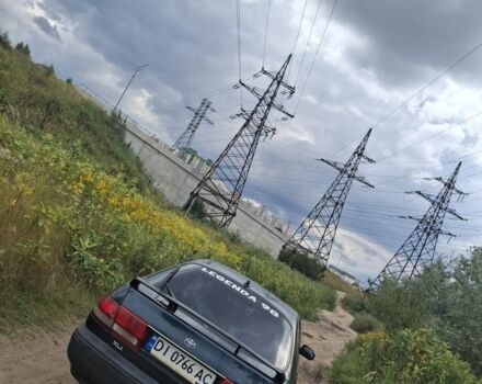 Зеленый Тойота Карина, объемом двигателя 2 л и пробегом 359 тыс. км за 2000 $, фото 1 на Automoto.ua