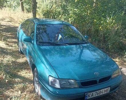 Зеленый Тойота Карина, объемом двигателя 1.8 л и пробегом 498 тыс. км за 2700 $, фото 1 на Automoto.ua