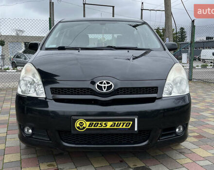 Черный Тойота Королла Версо, объемом двигателя 2 л и пробегом 200 тыс. км за 5500 $, фото 1 на Automoto.ua