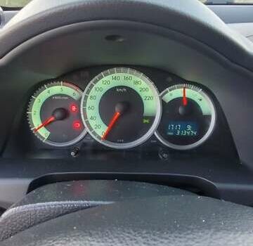 Серый Тойота Королла Версо, объемом двигателя 2 л и пробегом 313 тыс. км за 5700 $, фото 23 на Automoto.ua