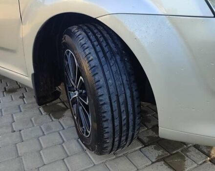 Серый Тойота Королла Версо, объемом двигателя 1.79 л и пробегом 247 тыс. км за 7900 $, фото 2 на Automoto.ua