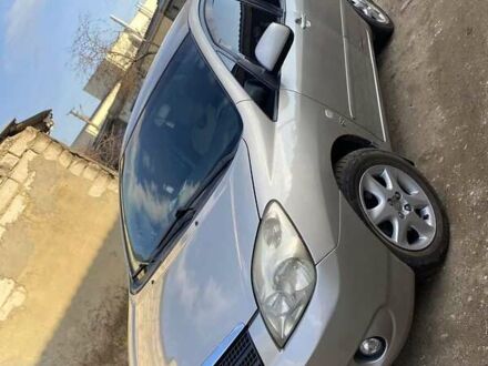 Серый Тойота Королла Версо, объемом двигателя 2 л и пробегом 208 тыс. км за 5900 $, фото 1 на Automoto.ua