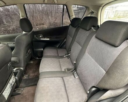 Синій Тойота Королла Версо, об'ємом двигуна 2 л та пробігом 235 тис. км за 1550 $, фото 5 на Automoto.ua