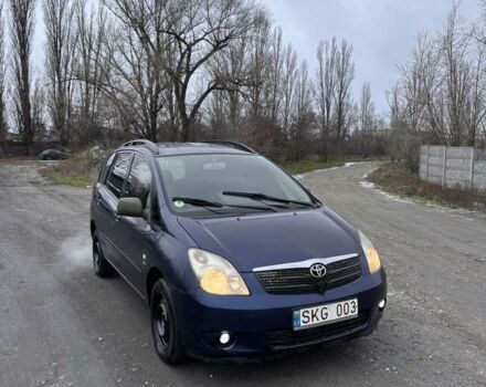 Синий Тойота Королла Версо, объемом двигателя 2 л и пробегом 235 тыс. км за 1550 $, фото 1 на Automoto.ua