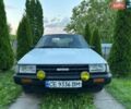 Белый Тойота Королла, объемом двигателя 1.3 л и пробегом 548 тыс. км за 700 $, фото 1 на Automoto.ua