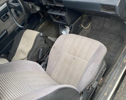 Белый Тойота Королла, объемом двигателя 1.3 л и пробегом 340 тыс. км за 850 $, фото 5 на Automoto.ua