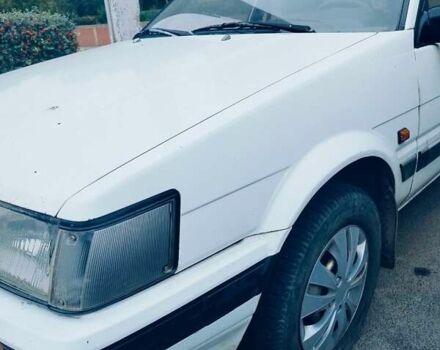 Белый Тойота Королла, объемом двигателя 1.3 л и пробегом 300 тыс. км за 1300 $, фото 1 на Automoto.ua