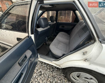 Білий Тойота Королла, об'ємом двигуна 1.3 л та пробігом 300 тис. км за 1300 $, фото 13 на Automoto.ua