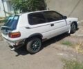 Белый Тойота Королла, объемом двигателя 1.3 л и пробегом 239 тыс. км за 1000 $, фото 1 на Automoto.ua