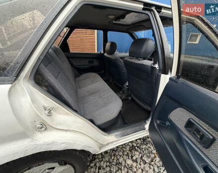 Белый Тойота Королла, объемом двигателя 1.3 л и пробегом 350 тыс. км за 1200 $, фото 16 на Automoto.ua